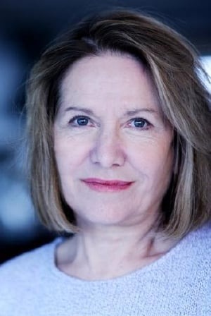 Picture of Catherine Hubeau wearing white dress.